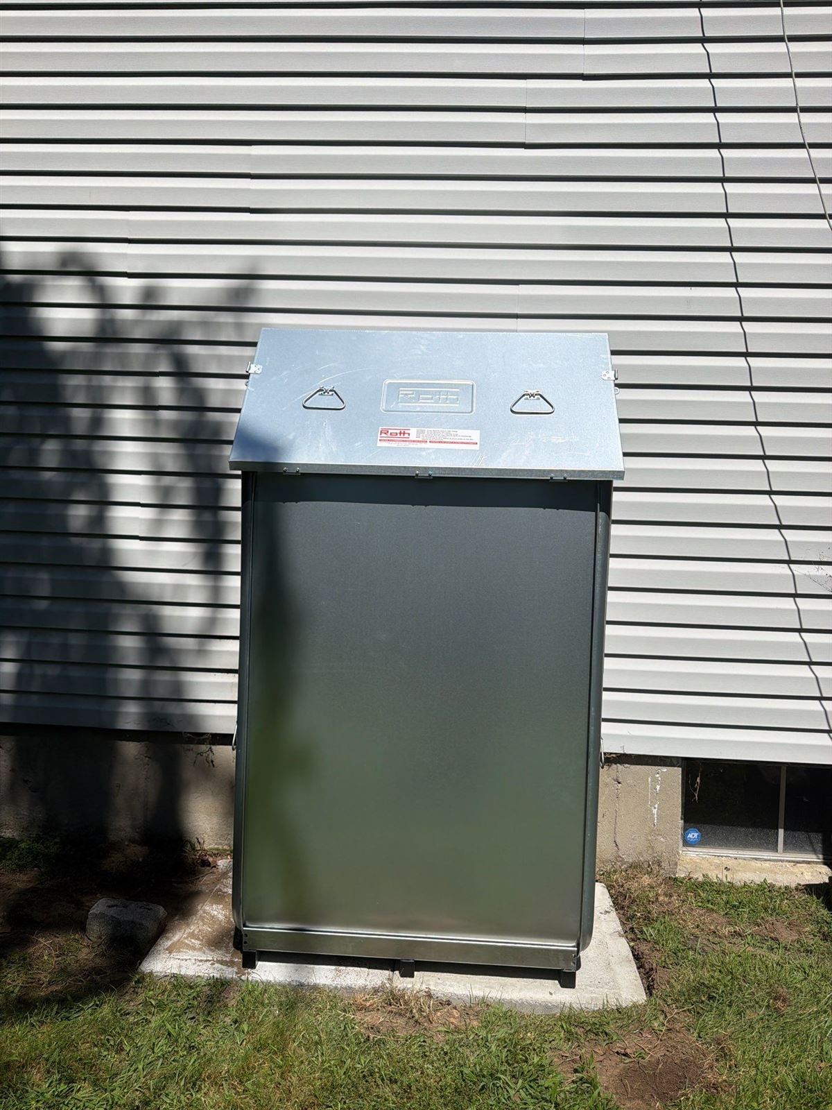 New Roth double-wall oil tank installed outside a home